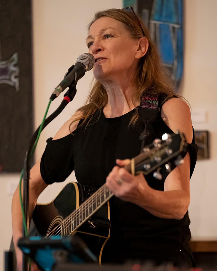 Woman playing guitar